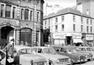 View: s18208 Norfolk Street at junction with Change Alley, 1960-1965, Norfolk Street, Nos. 26 - 38 premises belonging to Thomas A. Ashton Ltd., No. 18 J.W. Thornton Ltd., confectioners