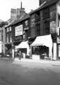 View: s18211 Shops on Norfolk Street between Theatre Royal and Hay and Sons Ltd., 1923-1935