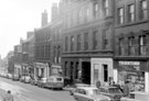 Norfolk Street, including No. 65, J.W. Thornton Ltd., confectioners, Rodger's Chambers and Norfolk Chambers