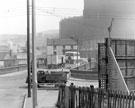 Traffic on Hillfoot Bridge taken from Wood Street looking across Penistone Road towards Farfield Inn (later Muff Inn) on Neepsend Lane with Neepsend Gas Works in the background