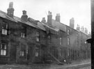 Nos. 100, 98, 96, 94 (with supports) etc. Neville Street taken from the corner of Fitzalan Street