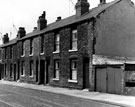 Nos. (right to left) 25, 23 etc., Nidd Road with the garage from No. 14 Ouseburn Street extreme right