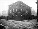 View: s18334 Bank buildings, Norfolk Street, at corner of George Street, (also known as Rodgers' House, when occupied by Jos. Rodgers and Son), Nether Congregational Chapel in background