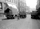 View: s18345 Norfolk Street, 1935-1936, Pawson and Brailsford Ltd., printers (left, with lorry outside), No.36 The Sheffield Club, in background