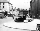 Norfolk Street near Change Alley, looking towards Fitzalan Square, No. 18 The Chocolate Kabin, J.W. Thornton Ltd., confectioners, left, Odeon Cinema, right