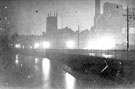 Night view of Nursery Street, showing River Don, Holy Trinity Church (centre) and Crown Corn Mill (right)