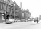 Nursery Street near the junction with Corporation Street looking towards Mowbray Street showing Nos. 177/179, J.W. Garner Ltd, hardware factors, 181 Harry Hartley and Son Ltd., shop fitters and Corporation Street Baths