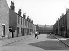 View: s18479 Ordnance Place looking across to the rear of housing on Liverpool Street (river Don at the end of the street), Brightside