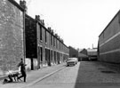No. 5, 7, 9 etc., Pagoda Street looking towards Midland Brass Works with the River Don at the end of the street in between with engineering works on the right