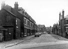 View: s18599 General view of Passhouses Road from Scott Road looking towards Firshill Road, Pitsmoor, No. 20 Scott Road extreme right