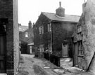 View: s18601 Nos 11 (foreground) and 13 Pass Houses, doorway of No. 14 (extreme left), Passhouses Road with rear of property on Abbeyfield Road in the background, Pitsmoor