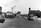Penistone Road with St. John C. of E. Church, Owlerton (right) and Sportsman's Group public house (centre left)