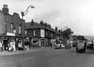 Penistone Road at the junctions with Borough Road and Burnell Road showing No. 895 H. and M. Ridge, newsagent, No. 897 W A Buckley, fruiterer