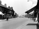 Penistone Road looking towards Driffield Street, Upper Slack and Annealers Ltd. (right) and Nos. including, 529/31 J. and N. Johnson 537, J.H. Swift and Sons and 561/563 J Winter and Son, pawnbroker (left)