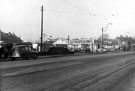 Garage and service station No. 176 Penistone Road North, looking towards Leppings Lane with rear of housing on Farndale Road (extreme left)