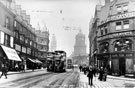 View: s18760 Pinstone Street at junction with Charles Street, No. 107 Harry Cassell, furrier, right, Nos. 78 - 80 Leonard Beswick, printer, left, Sheffield Cafe Co., Wentworth Cafe, in background