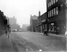 View: s18820 Pond Street looking towards Shude Hill and The Sheffield Cold Stores, meat wholesalers, No. 43 Owen's Cafe, No. 39 Swift and Co. Ltd., meat importers, right
