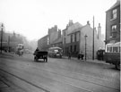 View: s18821 Pond Street at junction with Flat Street, Nos. 83 - 85 Royal Oak public house, extreme right, next to petrol pump, entrance to Court 7, Nos. 75 - 77 Beerhouse known as The Greyhound, note phone box, left