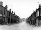 Popple Street looking towards Owler Lane showing No. 18 (with sign for D. M. Mansell, builder) left and No. 16 corner shop (right) Hinde Street