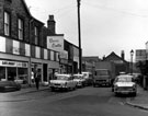 Streetscene in Proctor Place showing properties including Hillsborough Kinema House (right), Tregenza Road, motor accessories (centre), Atkin Ansell Co. Ltd., wholesale upholsterers (left)