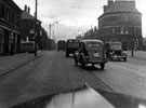 Queen's Road at junction with Myrtle Road and Shoreham Street, No. 528 Earl of Arundel and Surrey Hotel, right, Hodkin and Jones Ltd., building material merchants (Havelock Bridge Works), left