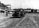 Ridgeway Road and City Road looking towards junction with Prince of Wales Road, premises on left include No. 2 Ridgeway Road, George Owen Ltd., chemists, No. 4 Abbett's, confectioners and Manor Cinema, City Road
