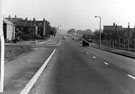 Ridgeway Road at junction with Kirkby Avenue, looking north. Rear of houses fronting Kirkby Road (Nos 24-28) and Seagrave Road (Nos 1-3)