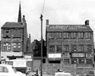 Nos. 79, 81 and 83, Rockingham Lane, premises include No. 83 H. Harrold, locksmiths and J. Bradley and Sons, builders, spire in background belongs to St. Matthew's Church, Carver Street