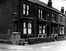 Nos. 44, 42, etc., Ronald Road, Darnall from Fisher Lane looking towards Sttaniforth Road, showing an poster advertising Model Railway Exhibition at the Cutlers Hall