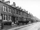 Terraced housing on St. Lawrence Road from opposite Oversley Road