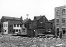 Construction of St. Mary's Gate, Hermitage Street looking towards rear of premises fronting Ellin Street, built over the Porter Brook, St. Mary's Lane, right, June 1956-August 1958