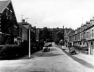 Sandford Grove Road from junction with Glen Road, looking towards rear of houses fronting Machon Bank