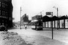 View: s19260 Tram No. 109 passing Thomas W. Ward Ltd., Savile Street, at junction of Attercliffe Road, looking towards the Wicker Goods Station and Depot