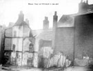 Part demolished gable end of No. 121 Scotland Street (former Crabtree public house) and rear view of Houses in Court No. 21