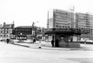View: s19390 Sheffield Midland railway station approach and British Rail enquiry office, Sheaf Street, Pond Street including Howard Hotel, No. 152 W.H. Benson Ltd., lino merchants (Factory) and construction of College of Technology