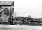 End of derelict No. 269 Sheffield Road looking towards Hadfield's East Hecla Works showing footbridge over the railway End of derelict No. 269 Sheffield Road looking towards Hadfield's East Hecla Works showing footbridge over the railway