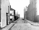 Shipton Street looking towards Oxford Street from Addy Street, demolition of Court No 2 and back to back housing, left, former Oxford Picture Palace and Upperthorpe Unitarian Chapel, right, Oxford Villa, in background, left