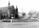 Firth Park roundabout looking up Sicey Avenue showing Firth Park United Methodist Church and Fine Fare Supermarket