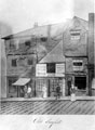 Snig Hill, left-right, No. 74 Howard Brothers, butchers; No. 72 hairdressers and tobacconist belonging to Joe Turner, No. 70 oyster dealer belonging to Harry Fox