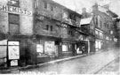 View: s19533 Snig Hill from West Bar, derelict timber framed shops, prior to demolition in 1900