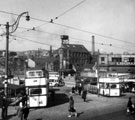 View: s19540 Bridge Street and Coulston Street from bottom of Snig Hill, No. 38 Bridge Street, E. Weston and Sons, stationers, right, Tennant Brothers, Exchange Brewery in background