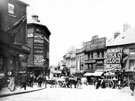 Snig Hill from junction with Angel Street, Bank Street and Castle Street, former printing offices of the Sheffield Independent, left, No. 48 Bombay Tea Co., tea merchants, No. 50 J. Wilson and Son, toy importers, Great Central Toy Warehouse, right