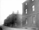 Cooke and Stevenson Ltd., electrical engineers, (formerly the Catholic Boys Hostel), No. 222 Solly Street at the junction with Corn Hill looking towards property awaiting demolition