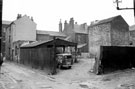 South Lane looking towards rear of properties fronting Hereford Street, rear of Nos. 17 and 19, left