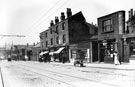 Spital Hill showing Nos. 83 Thorneloe and Co., watch makers, 81 W Hewitt, coal merchant, 79 J W Storey, newsagent also 59 Midland Railway stables, Spital Hill looking towards The Wicker Arches