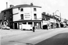 View: s19634 No. 127, Flynn's Fashion House, gown manufacturers, 129, R. Mattock and Sons, butchers, etc., Spital Hill, from the junction with Spital Street looking towards The Coliseum, picture house