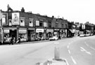 Businesses including, Nos. 86 A.E. Bailey and Sons Ltd., grocers, 82, W. Evans, greengrocer, 80, T. Marsland, shoe repairer, etc., Spital Hill from the junction with Hallcar Street/ Burngreave Road