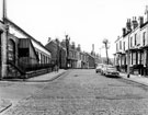 View: s19690 Stalker Lees Road, Sharrow, premises on left include Nos. 63 - 65, J.F. Eardley Ltd., soft drink manufacturers, No. 63, Mills Bros. (Sheffield) Ltd., precision engineers