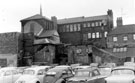 Rear of Sycamore Street from car park on Tudor Way. Sycamore Street from Tudor Way (previously Arundel Street). Premises include No 21, Tudor Way, Refuse and Disposal Dept., Public Baths and Wash-houses, left. The Sheffield Victoria Club Ltd.