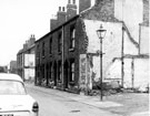 Partly demolished housing opposite the Weleyan Reform Church, Surbiton Street Partly demolished housing opposite the Weleyan Reform Church, Surbiton Street